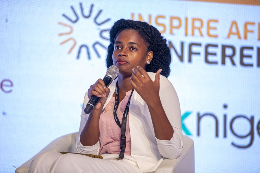 Vanessa Kisowile speaking on stage